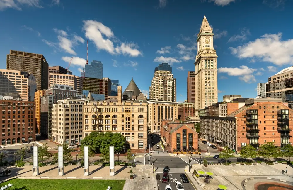 Downtown Boston skyline — Massachusetts rental property investment financed with a DSCR loan — The Doce Mortgage Group