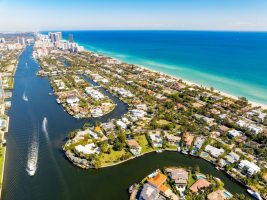 AerialPhotoGoldenBeachFlNeighborhoodWithLuxuryWaterfrontMansions